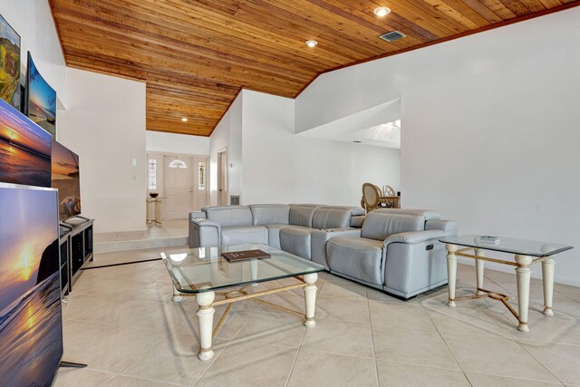 living area with light tile patterned flooring, visible vents, recessed lighting, and wooden ceiling