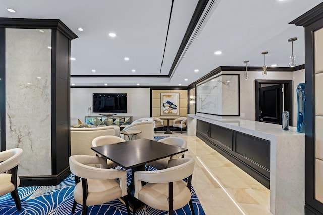 dining area featuring ornamental molding