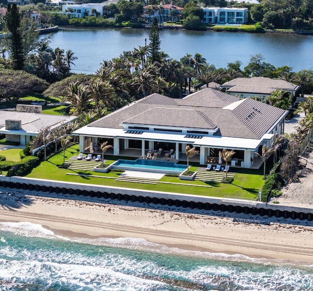 aerial view with a beach view and a water view