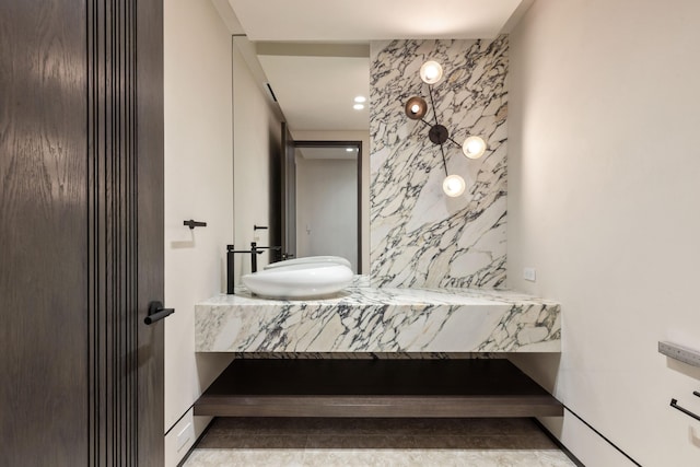1160 S Ocean Blvd, Manalapan, FL 33462 - bathroom with an accent wall and vanity