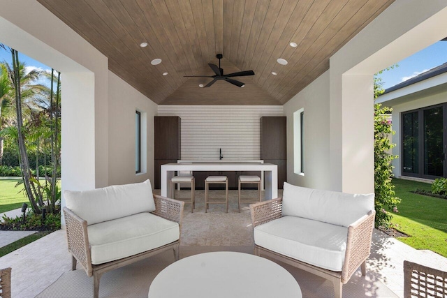 view of patio / terrace with ceiling fan and outdoor lounge area