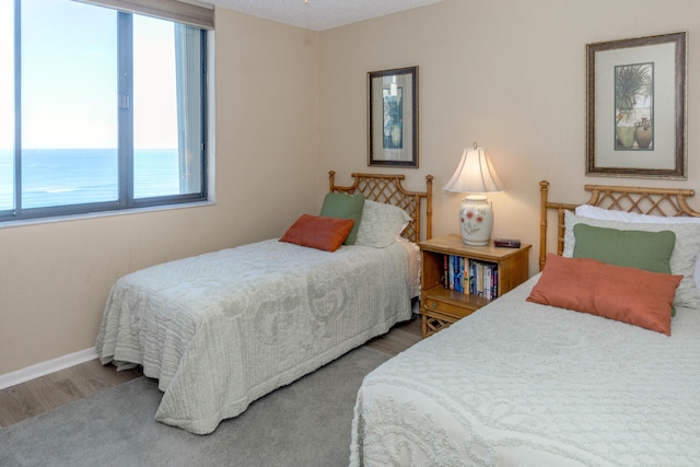 bedroom with a water view