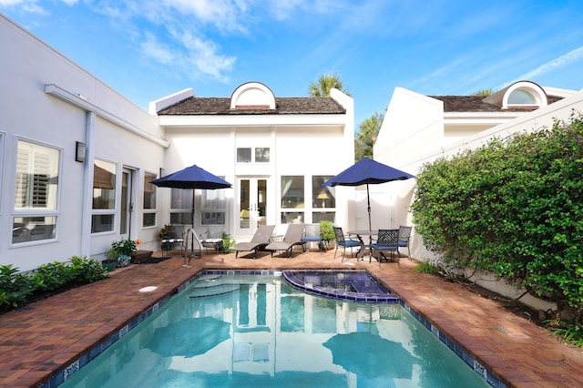 rear view of house featuring a patio area