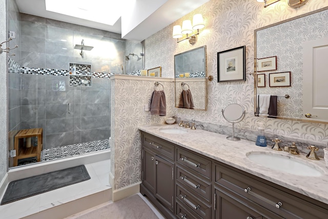 bathroom featuring an enclosed shower and vanity