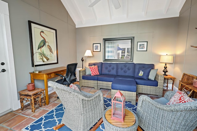 living room with tile patterned flooring and lofted ceiling with beams