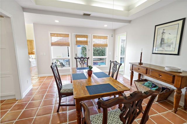 dining space with light tile patterned flooring