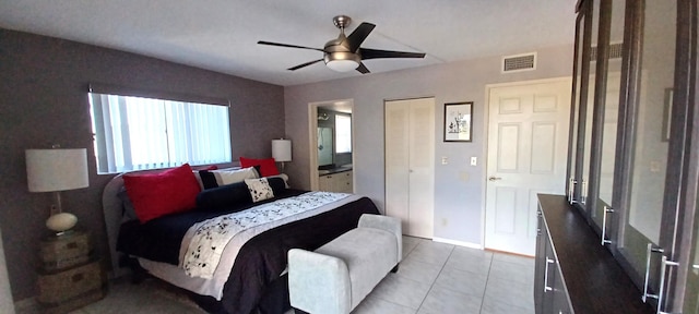 bedroom featuring light tile patterned floors and ceiling fan