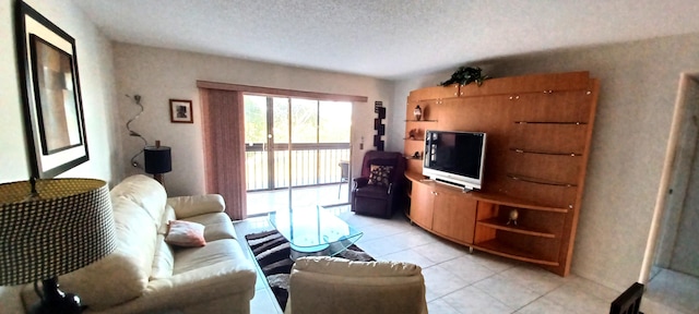 tiled living room with a textured ceiling