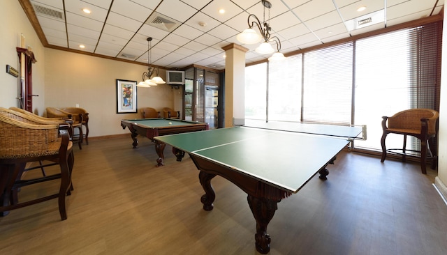 playroom featuring a paneled ceiling, dark hardwood / wood-style floors, a wealth of natural light, and billiards