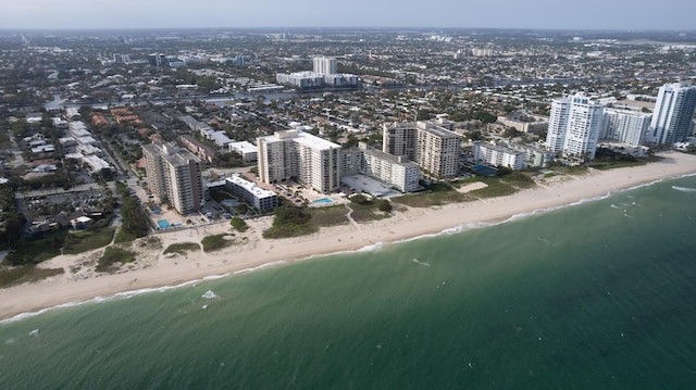 aerial view with a view of the beach and a water view