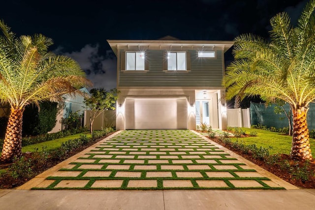 view of front of property featuring a garage