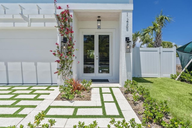 property entrance with a yard