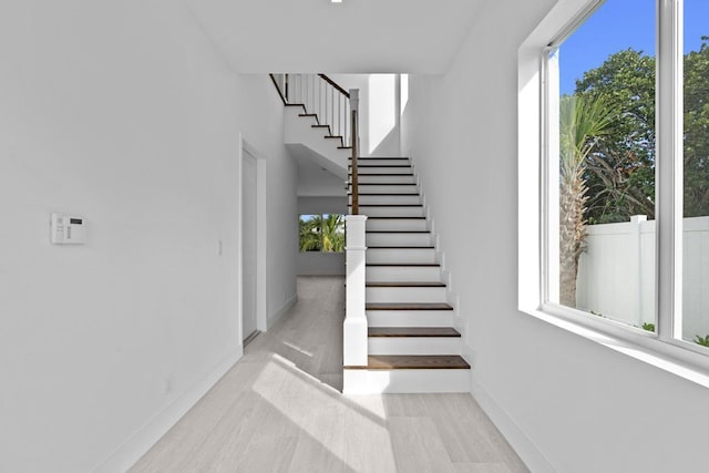 stairs with a wealth of natural light