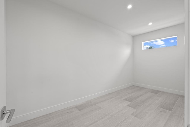 unfurnished room featuring light wood-type flooring