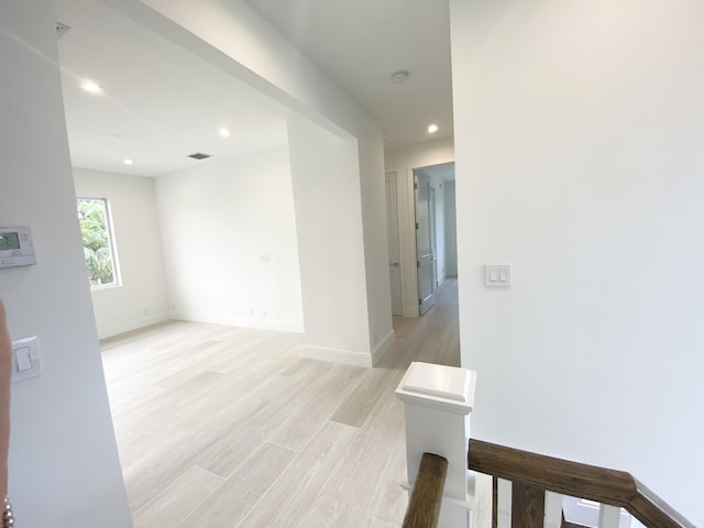 hallway featuring light hardwood / wood-style flooring