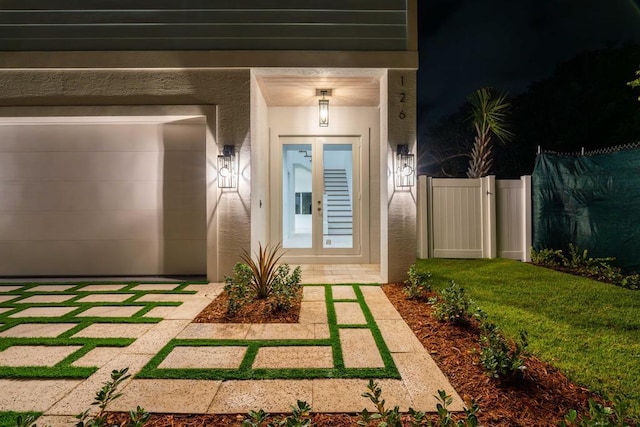 property entrance with a garage