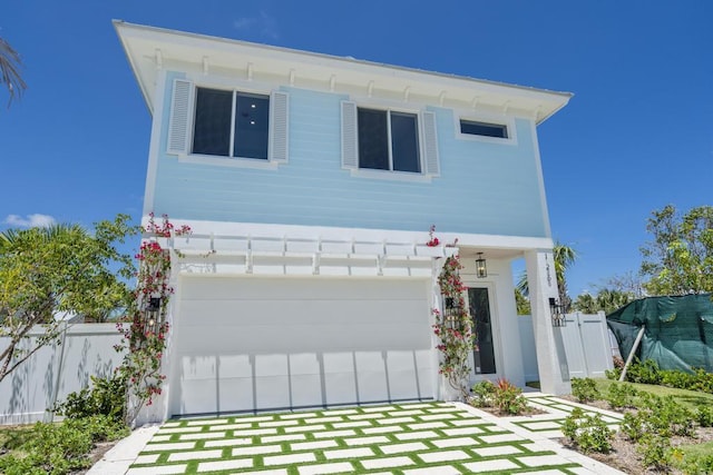 view of front of property featuring a garage