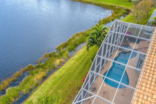 drone / aerial view with a water view