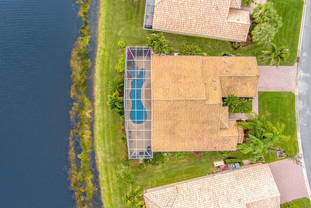 drone / aerial view with a water view