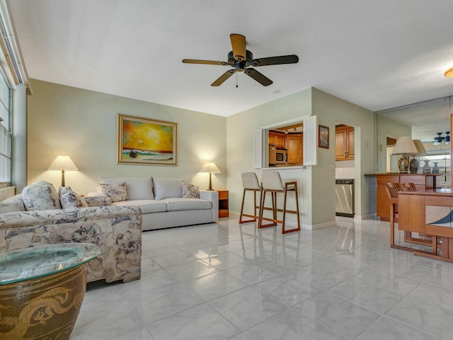 living room with ceiling fan