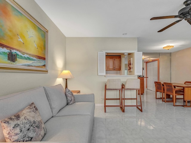 living room featuring ceiling fan