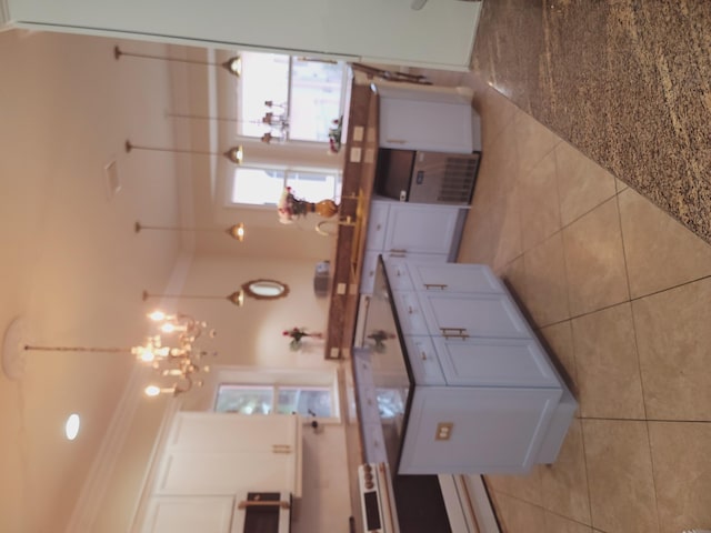 kitchen featuring tile walls