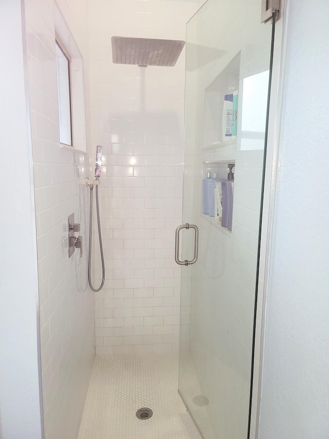 bathroom with a stall shower