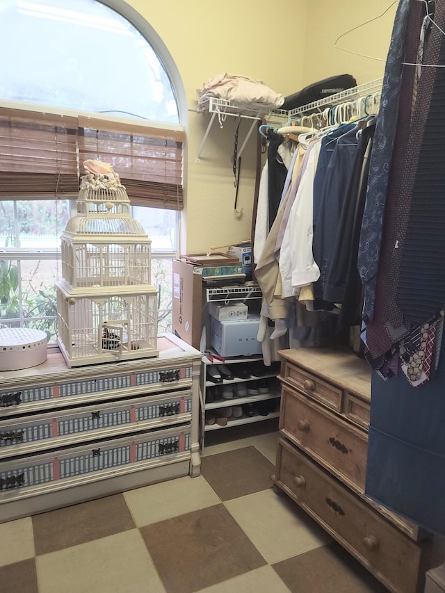 walk in closet featuring tile patterned floors