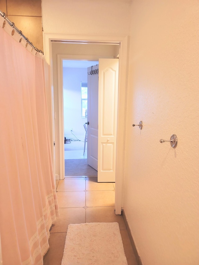 hallway with baseboards