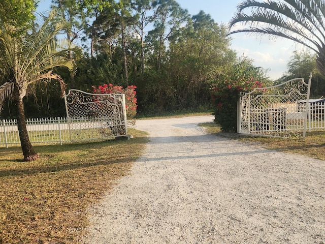 view of gate with fence