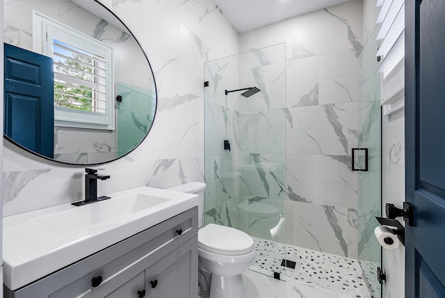 bathroom featuring a marble finish shower, backsplash, toilet, marble finish floor, and vanity