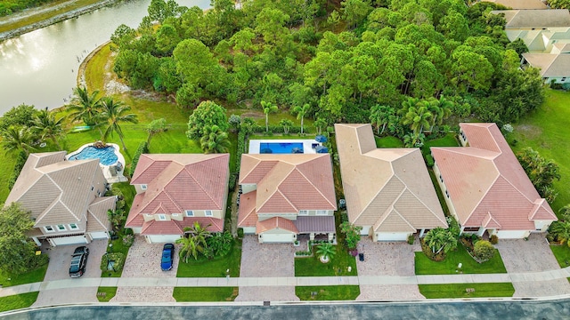 aerial view with a residential view and a water view