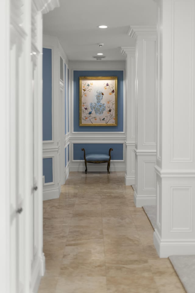 corridor with a decorative wall