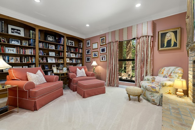 sitting room with recessed lighting, ornamental molding, and carpet flooring