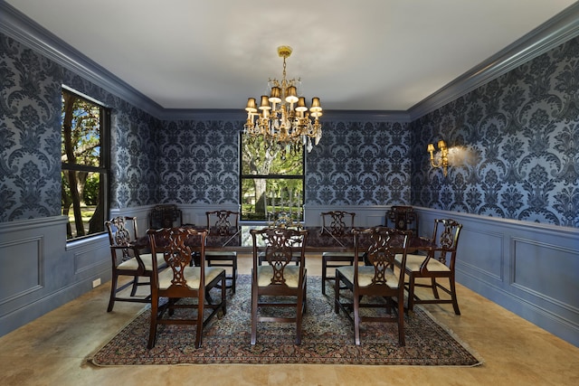 dining room with a chandelier, a wainscoted wall, wallpapered walls, and ornamental molding