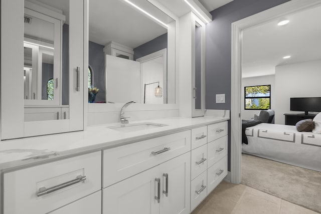 ensuite bathroom featuring vanity, visible vents, ensuite bath, recessed lighting, and tile patterned flooring