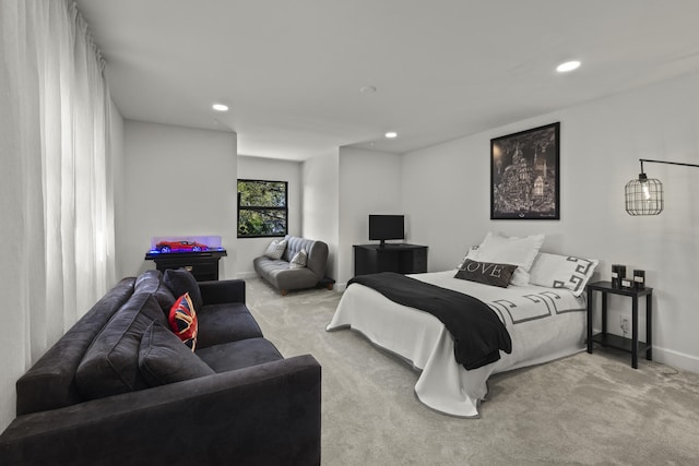 bedroom with recessed lighting, baseboards, and carpet floors