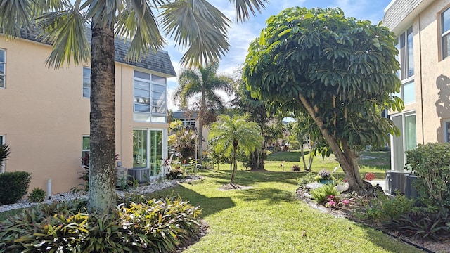 view of yard featuring central AC