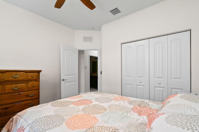 bedroom with ceiling fan and a closet