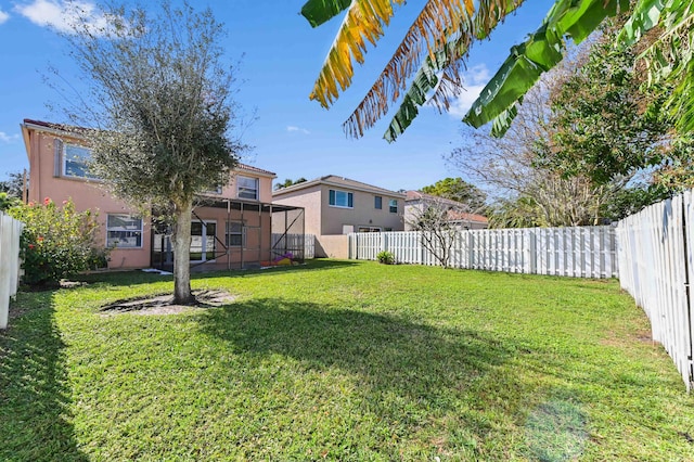 view of yard featuring a fenced backyard