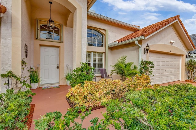 entrance to property featuring a garage