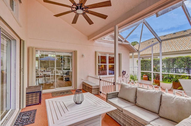 sunroom / solarium with vaulted ceiling and ceiling fan