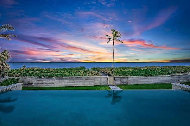 exterior space with a water view