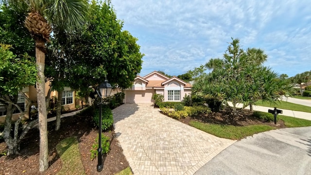 view of front of property with a garage