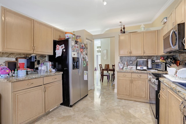 kitchen featuring light stone countertops, appliances with stainless steel finishes, light brown cabinets, and backsplash