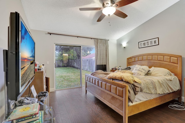 bedroom featuring dark hardwood / wood-style floors, a textured ceiling, access to exterior, and ceiling fan