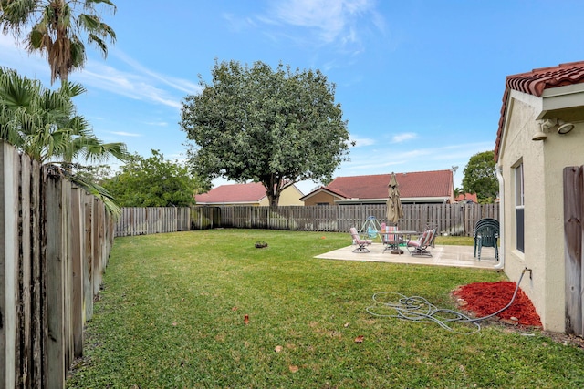 view of yard with a patio area