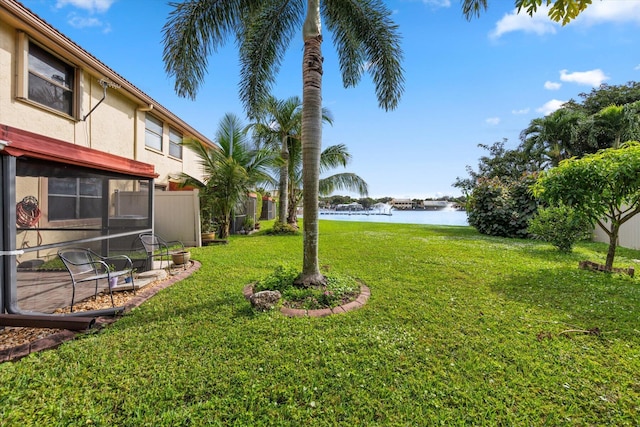 view of yard with a water view