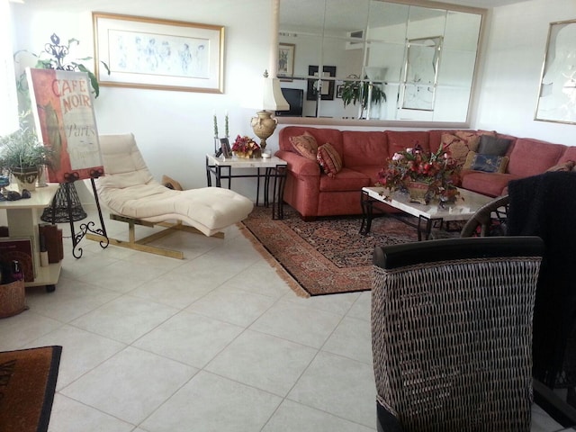 living area featuring light tile patterned floors