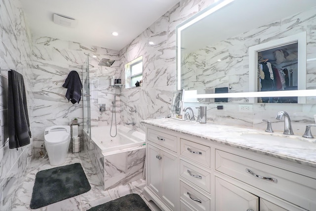 full bathroom with vanity, tiled shower / bath combo, tile walls, and toilet